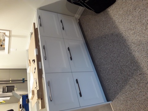 Basement during the build: cabinets going in
